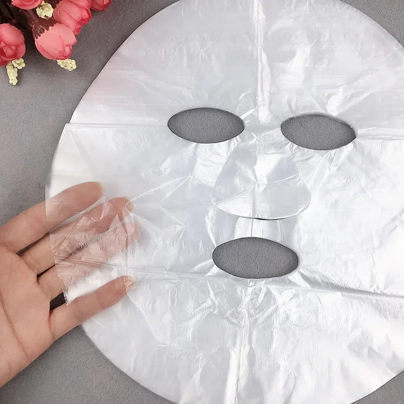 Disposable Face Plastic Film T - Sheet Face Mask Pack recension och pris